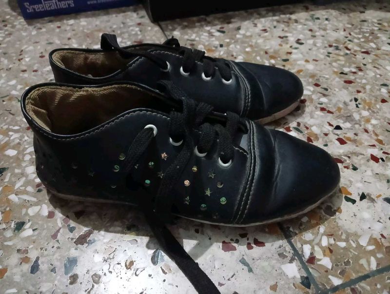 black sneakers