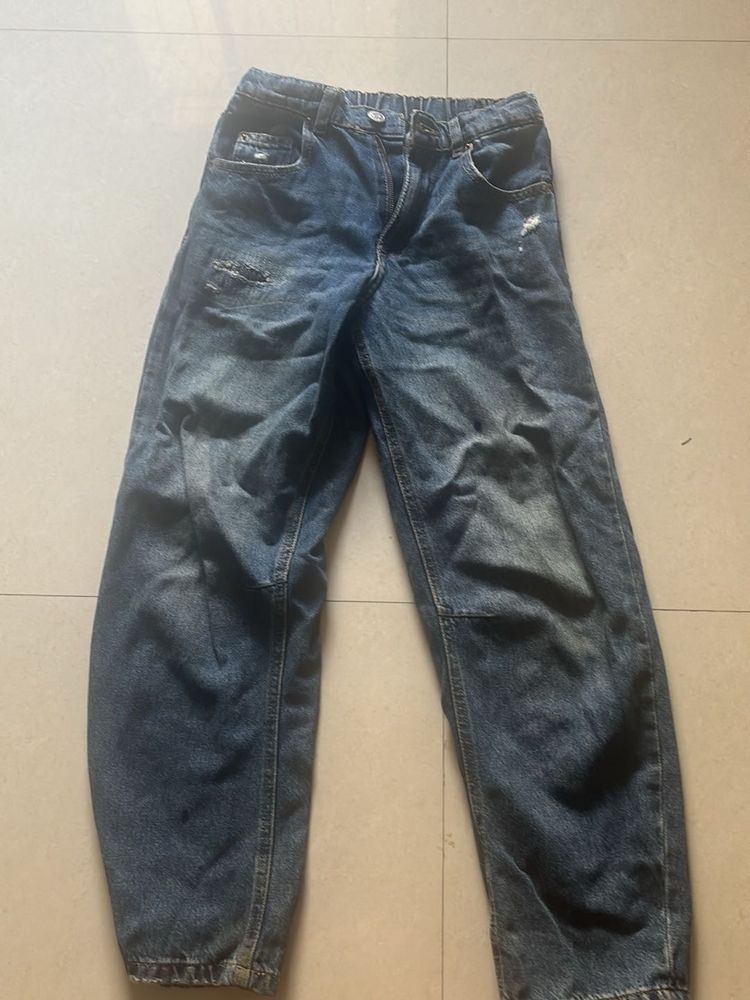 Distressed Blue Denim Jeans