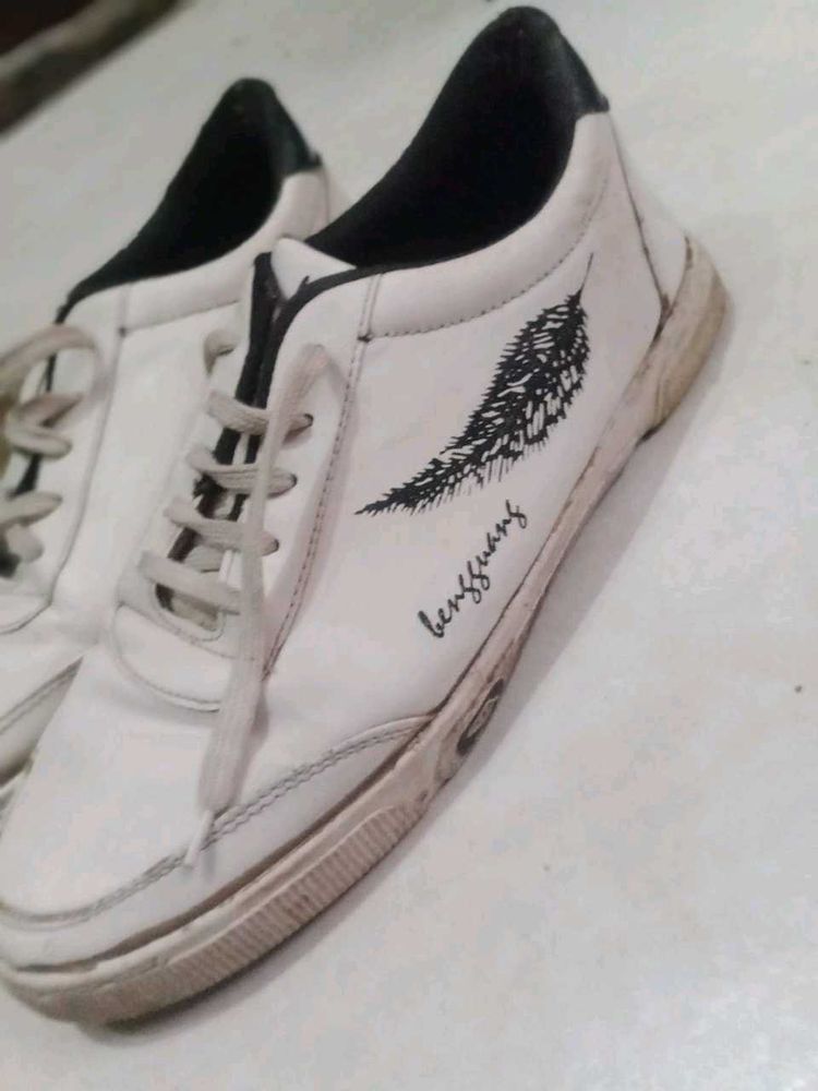 White Sneakers with Feather Design