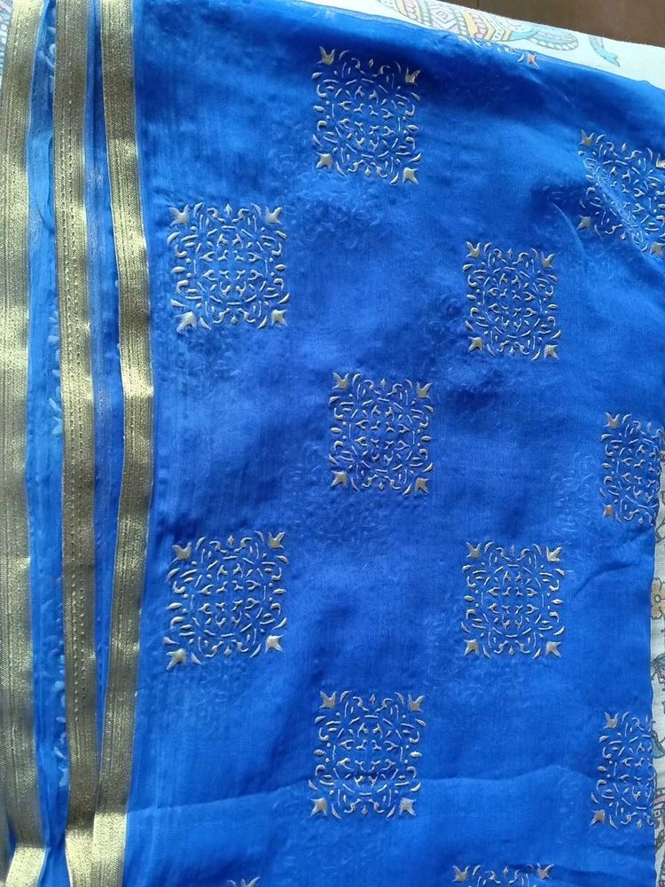 Vibrant Blue Saree with Gold Motifs