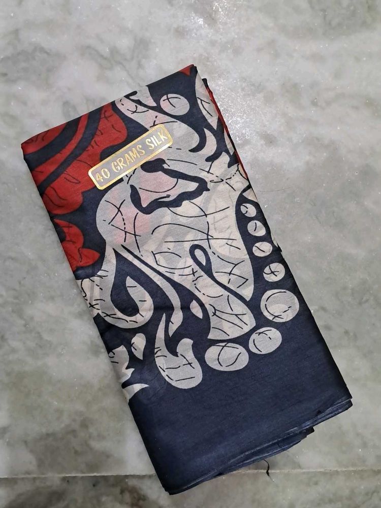 A brand new original 40 gms Silk Saree