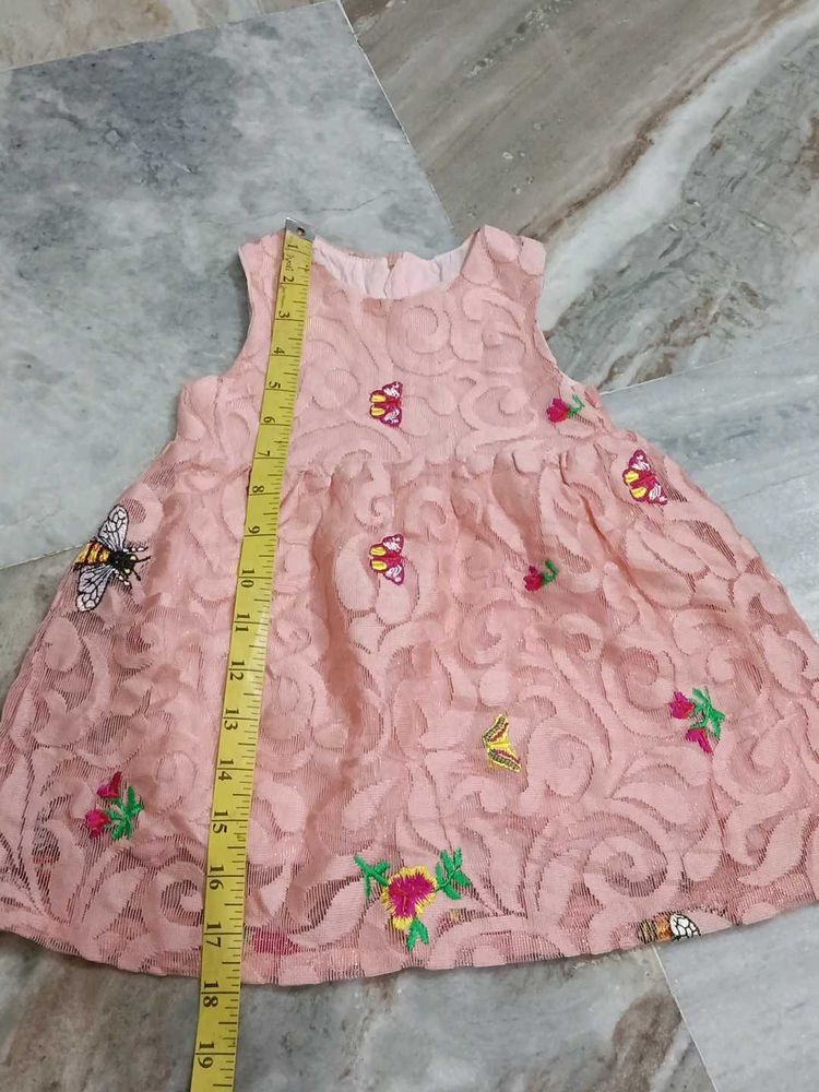 Adorable Pink Lace Dress with Butterfly Motifs