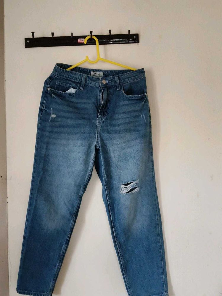 Distressed Blue Denim Jeans