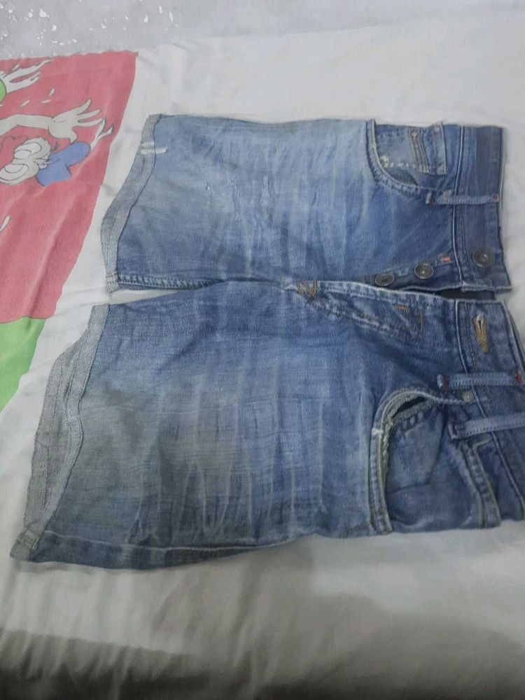 Distressed Blue Denim Jeans