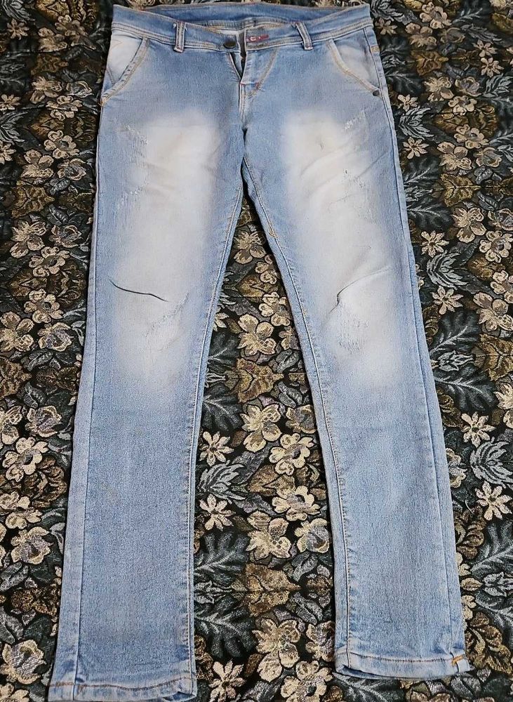 Light Wash Distressed Denim Jeans