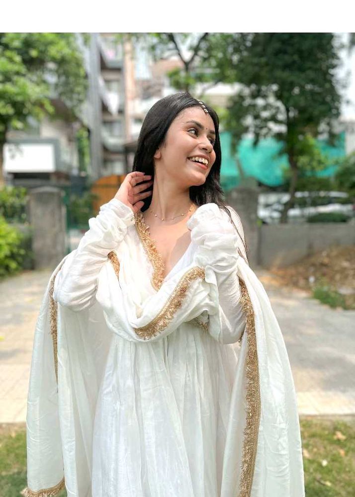 Elegant White Ethnic Gown with Gold Trim