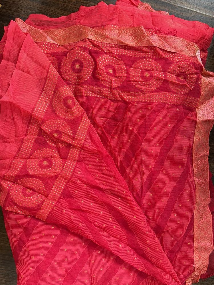 Vibrant pink Saree with Gold Print