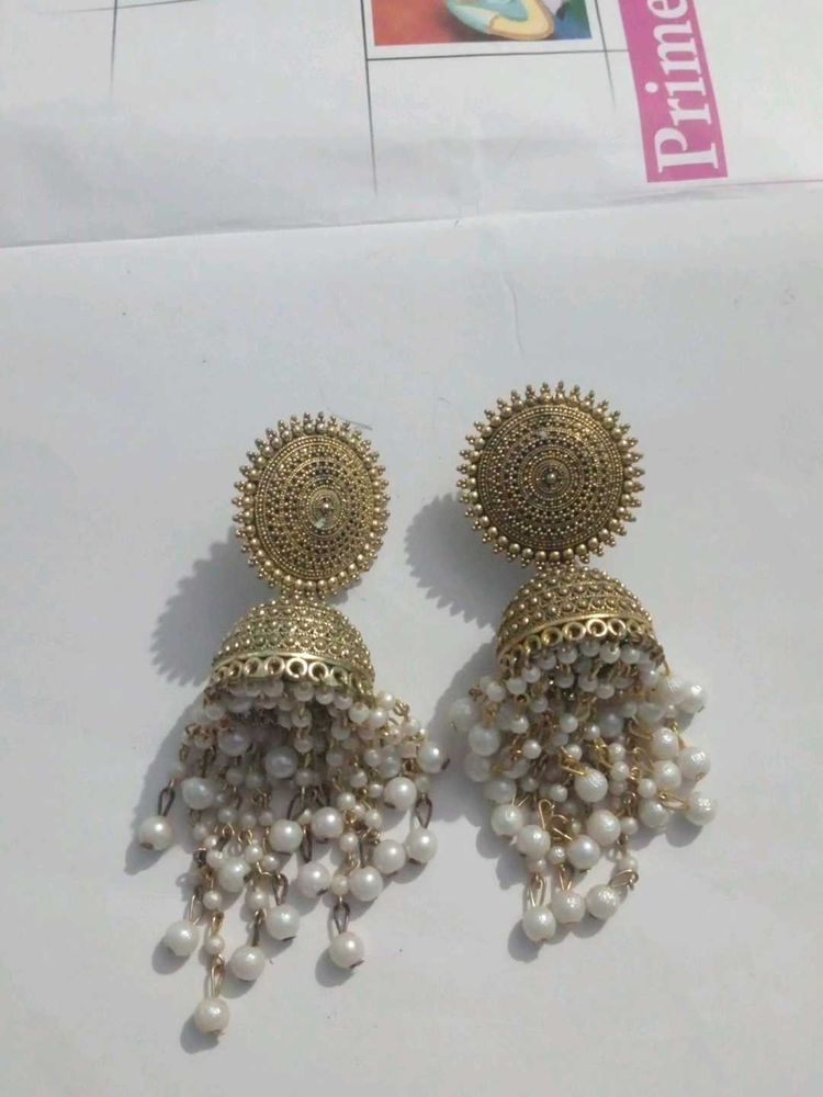 Traditional Gold Jhumka Earrings with Pearls