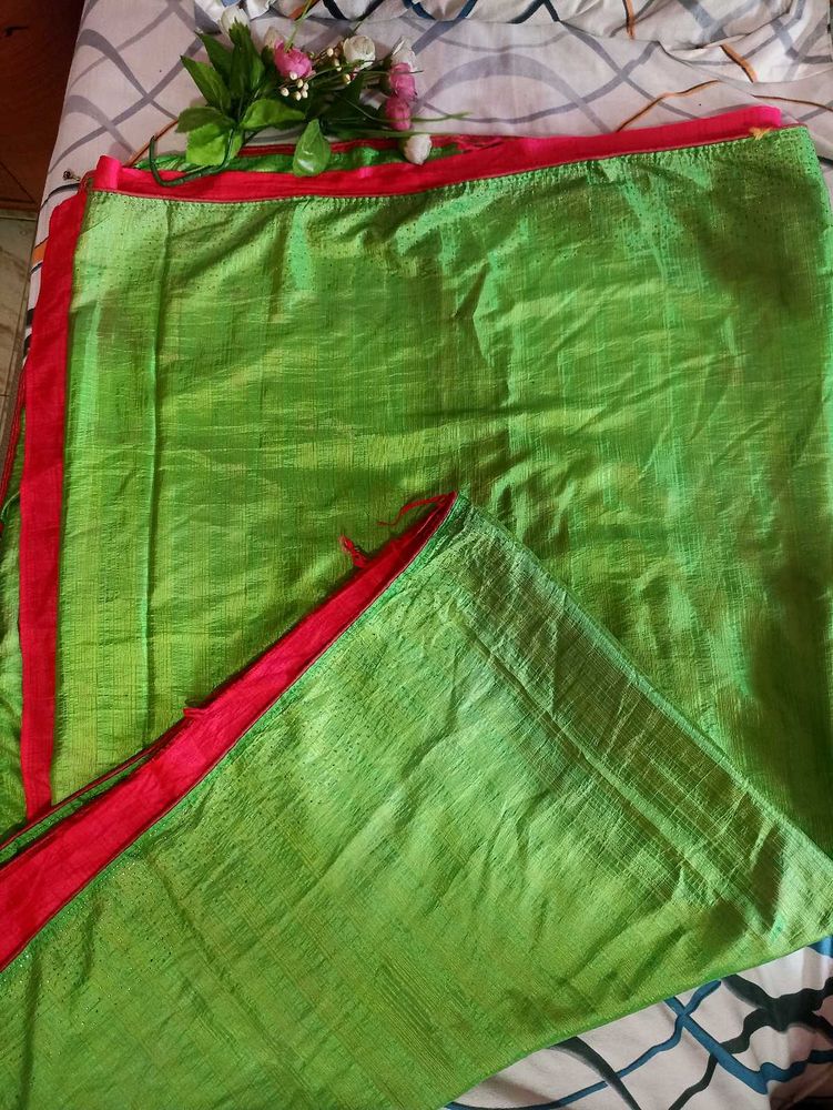 Vibrant Green Saree with Pink Border