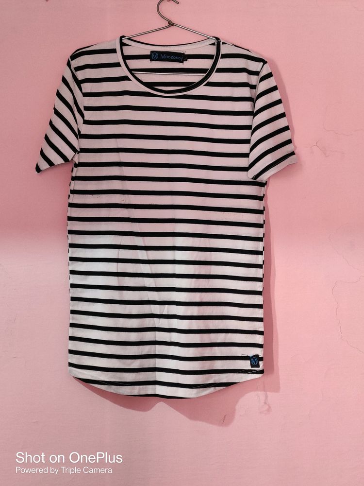 We Are Selling A Black &amp; White Striped Tshirt 👕