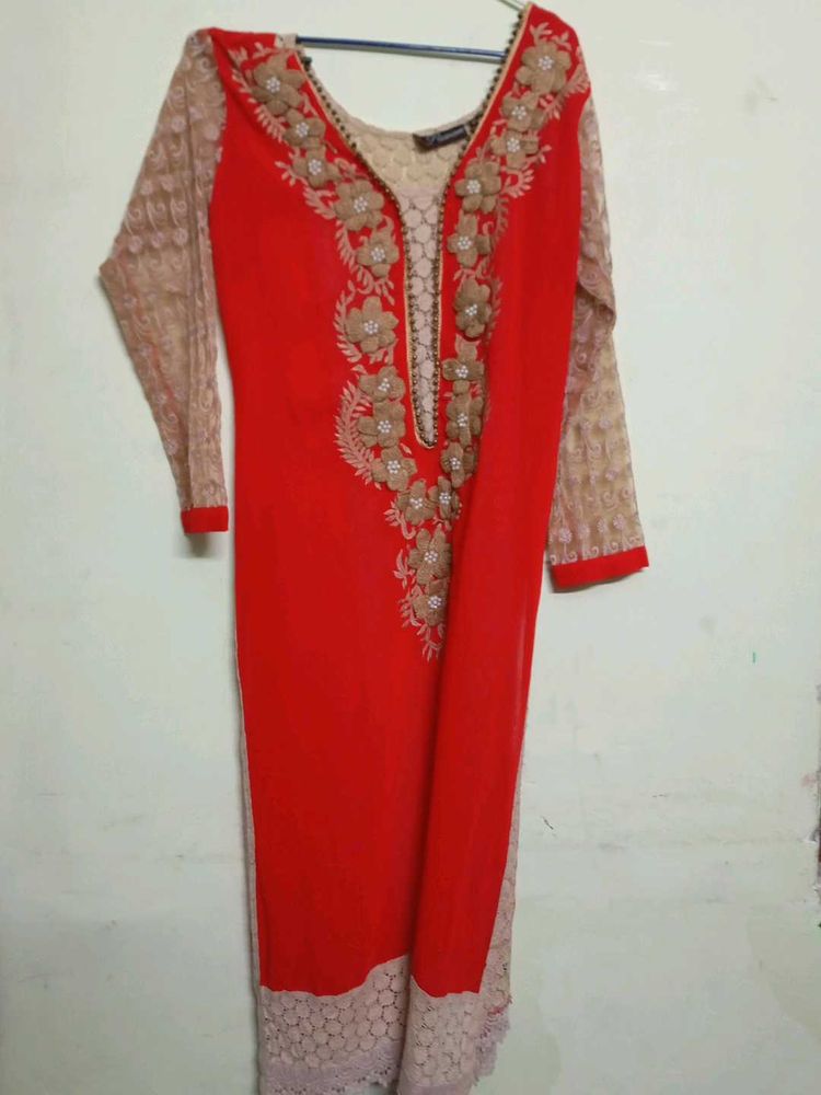 Elegant Red Kurta with Intricate Embellishments