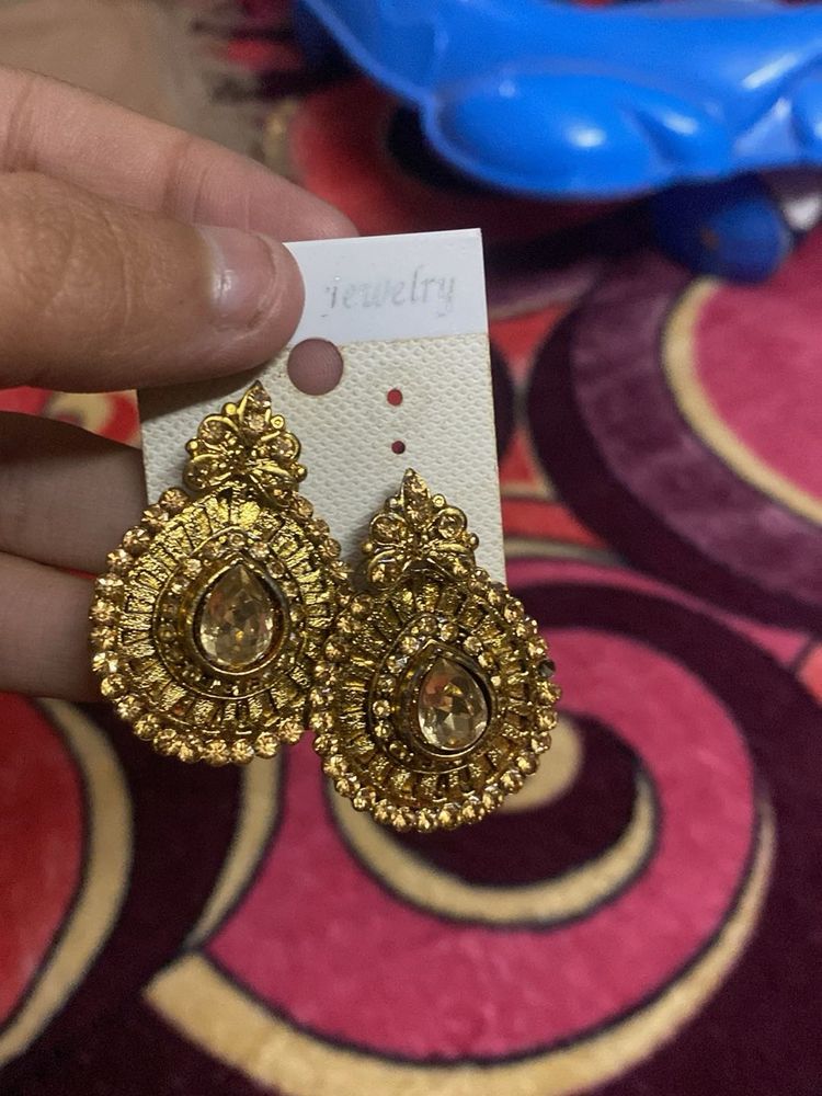 Elegant Gold Tone Jhumka Earrings