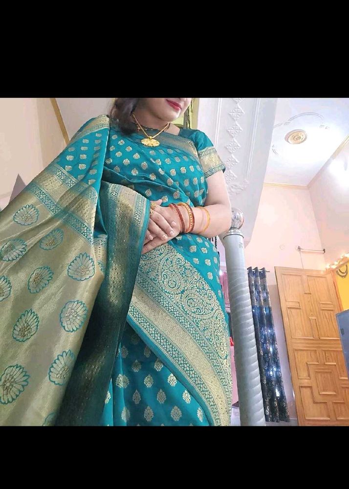 Elegant Teal Silk Saree with Gold Border