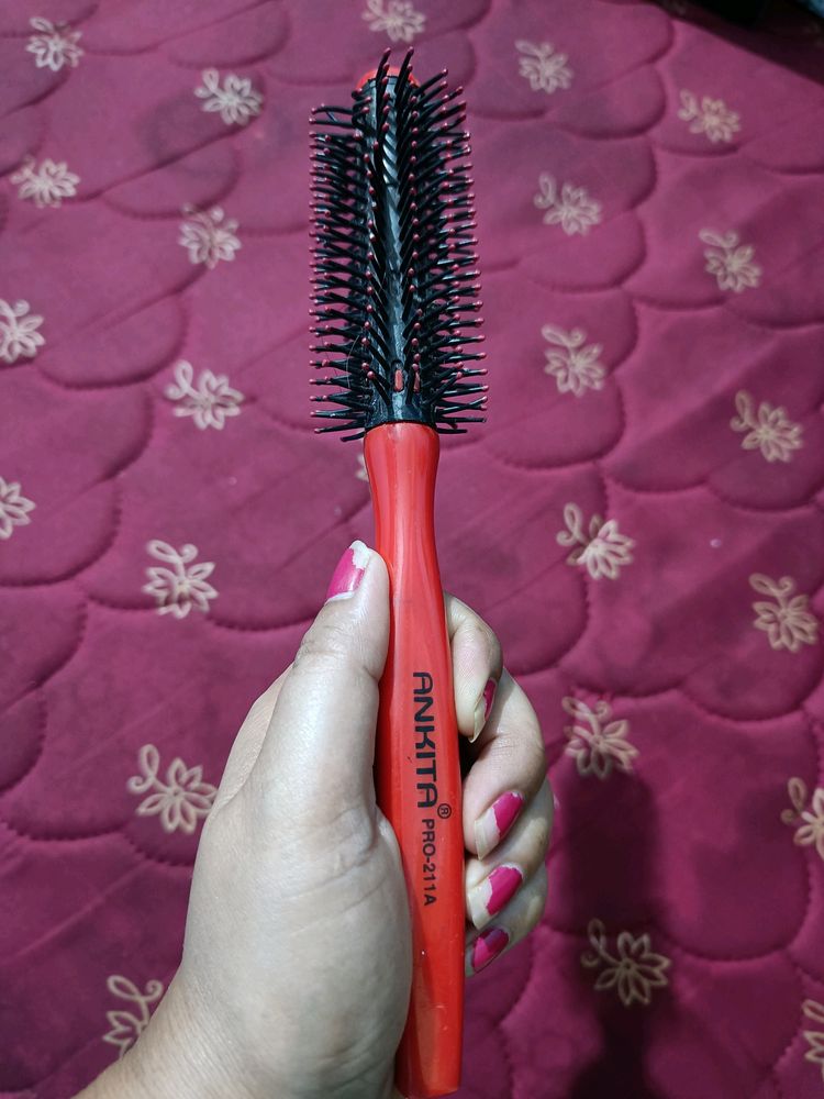 Brand New Rolling Hair Brush.