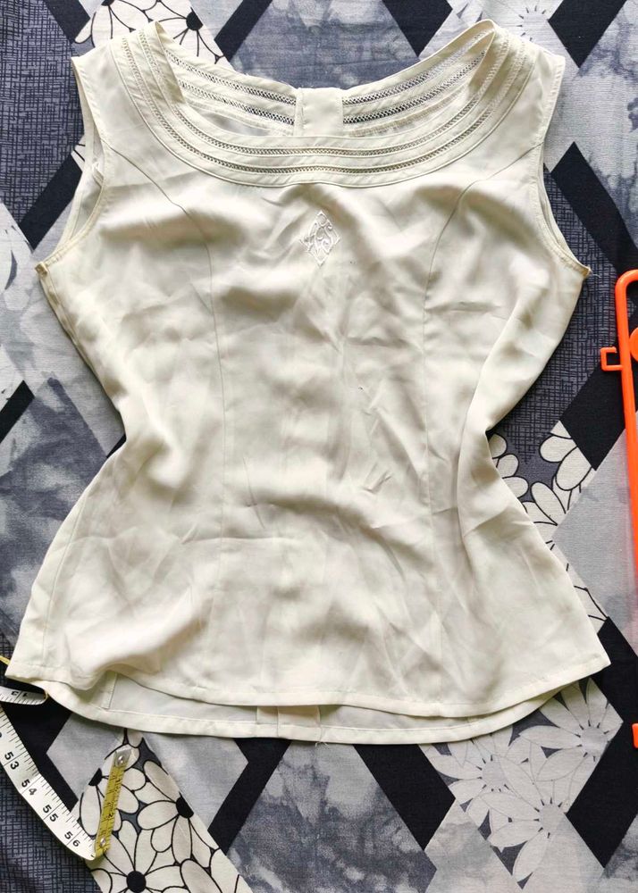 Elegant Cream Sleeveless Top