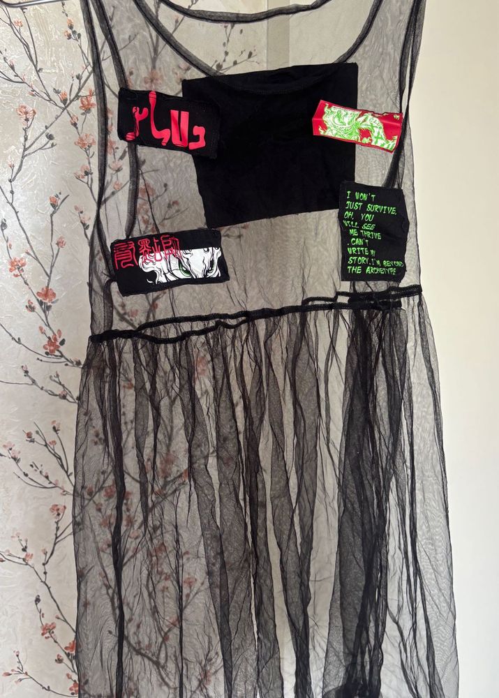 Unique Black Sheer Gown with Patches