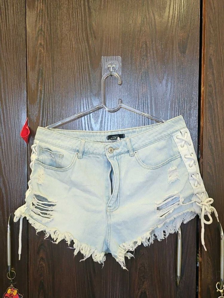 Distressed Lace-Up Denim Shorts