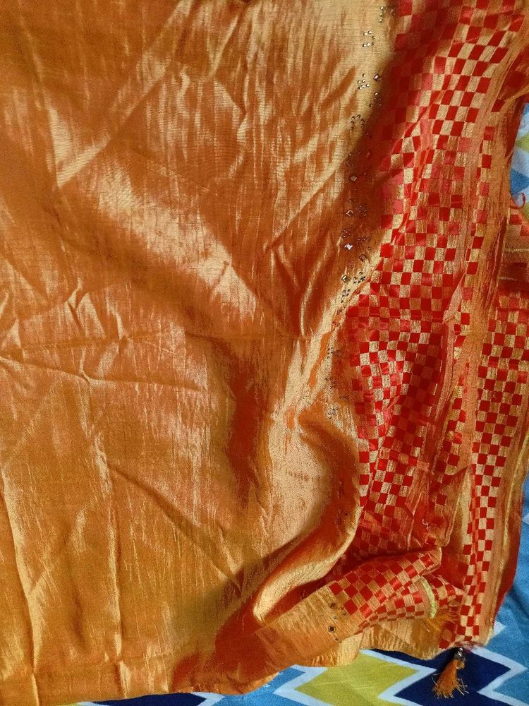 Stunning Orange Saree with Red Border