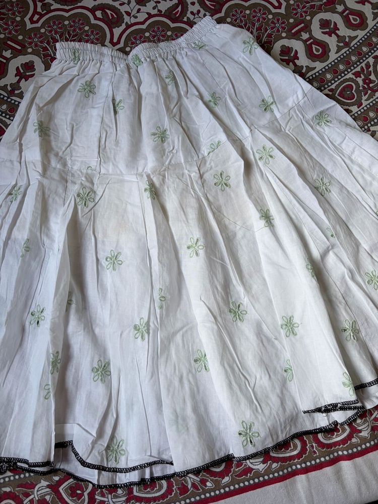 White Skirt with Green Floral Embroidery