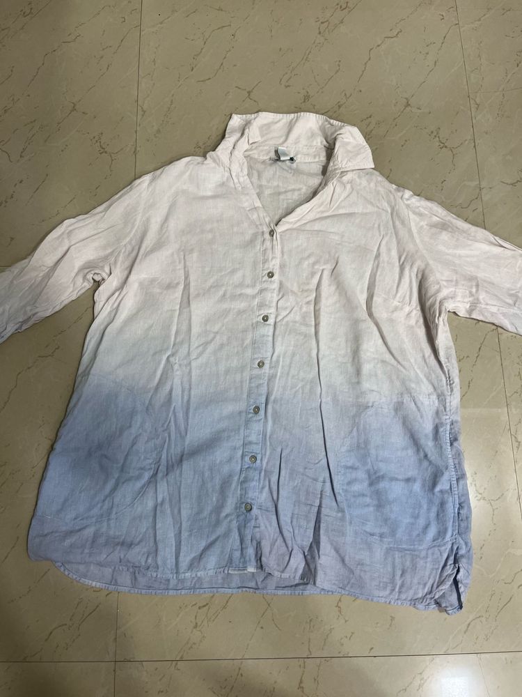 blue and white shirt with short sleeves