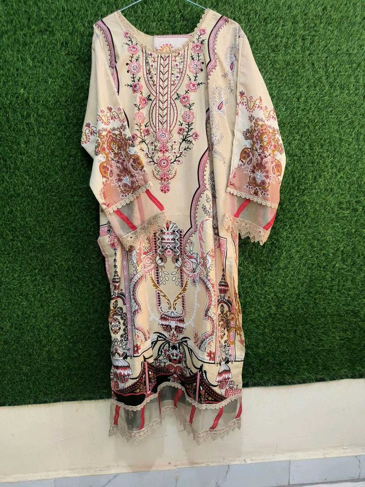Elegant Beige Kurta with Intricate Embroidery