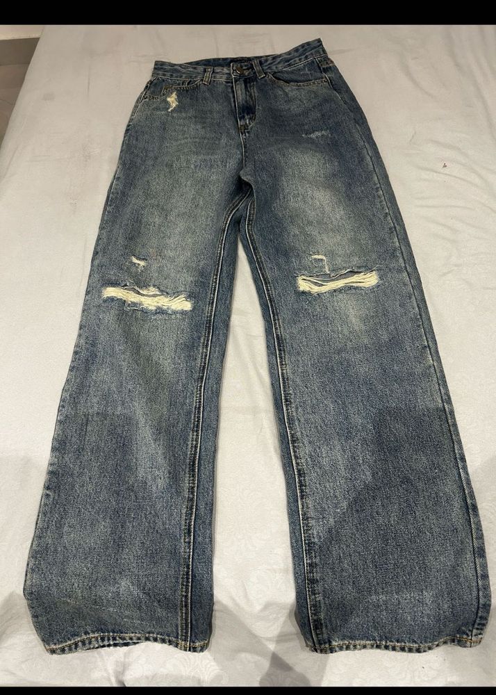 Distressed Blue Wide-Leg Jeans with black shirt