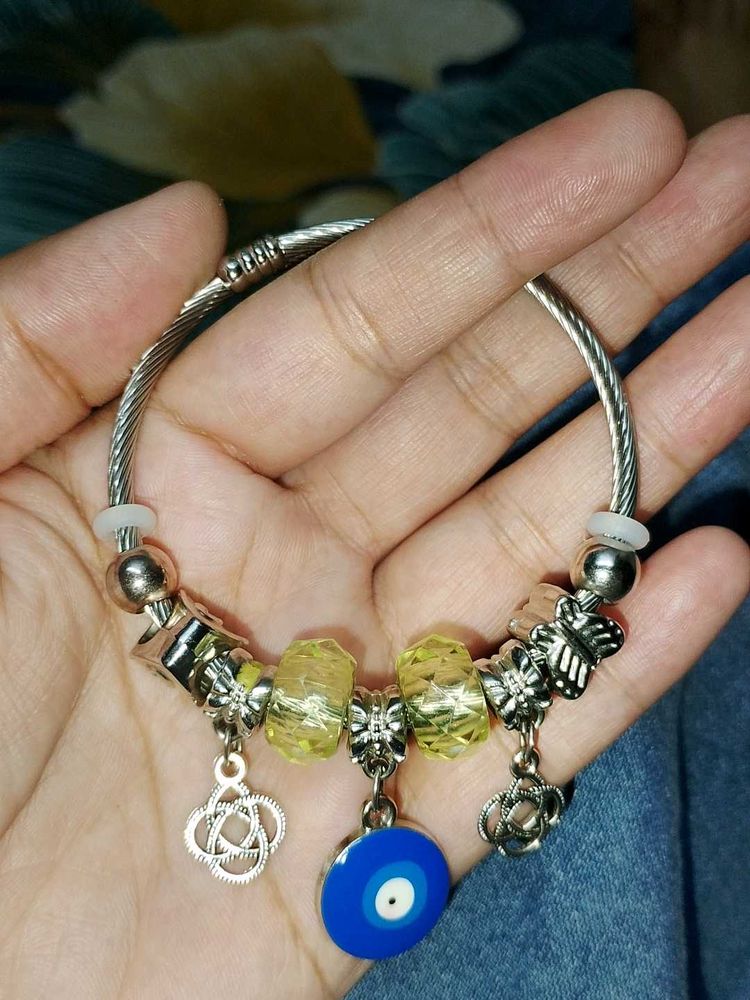 Charming Charm Bracelet with Yellow Beads