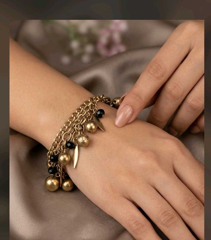 Gold Tone Charm Bracelet