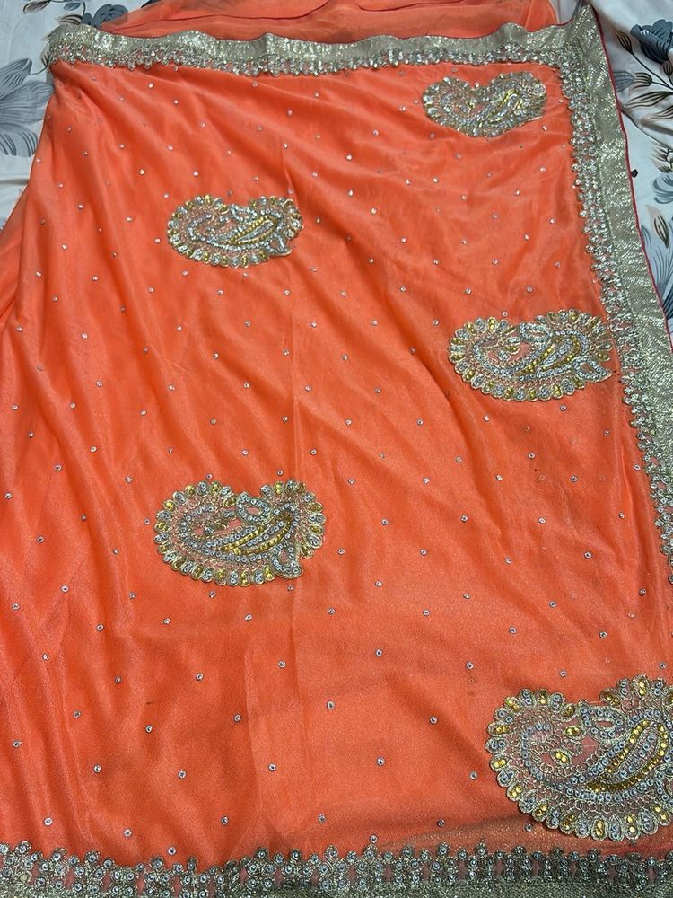 Stunning Orange Embroidered Saree