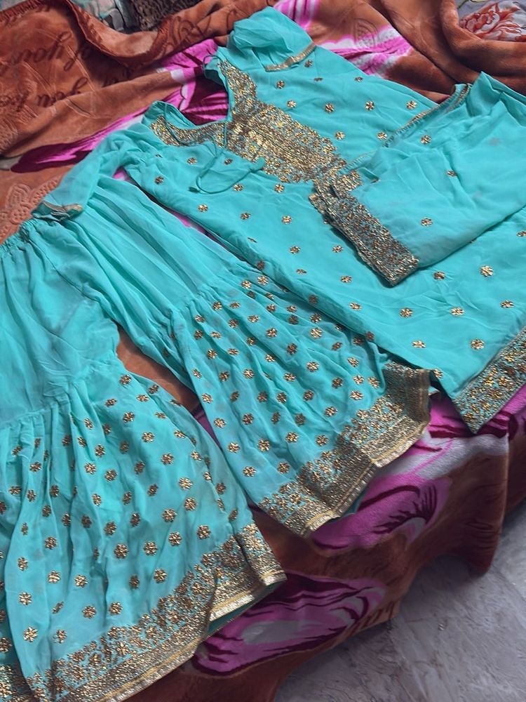 Beautiful Teal Kurta Set with Gold Embroidery
