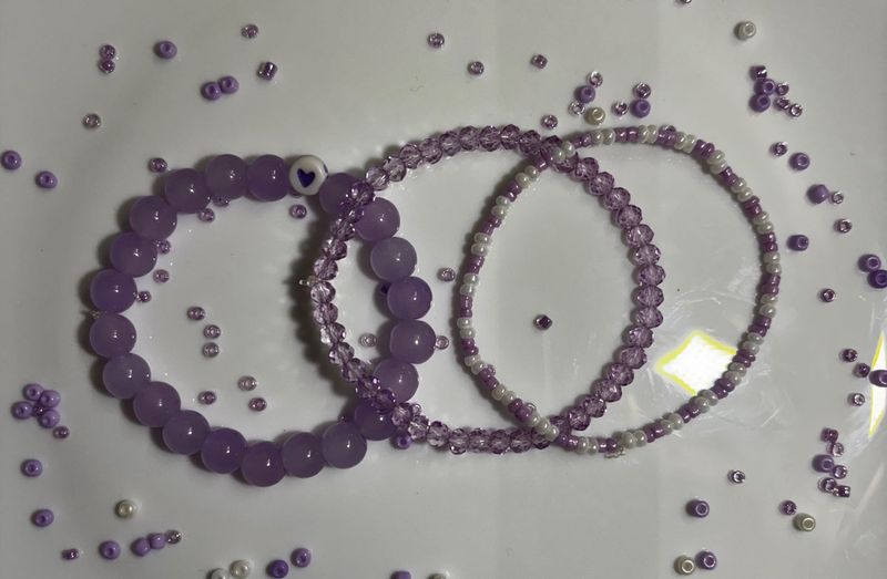purple bracelet stack