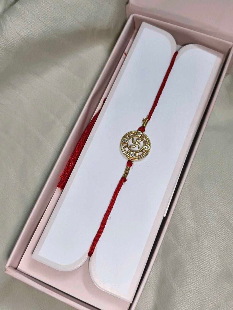 Designer silver  Swastik Rakhi with Stones