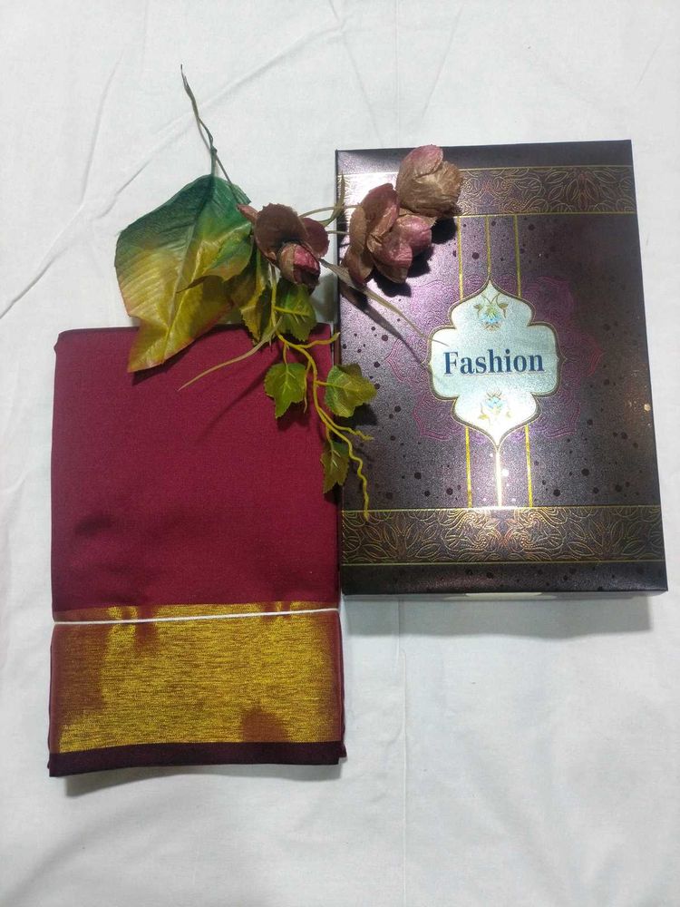 Elegant Maroon Saree with Golden Border