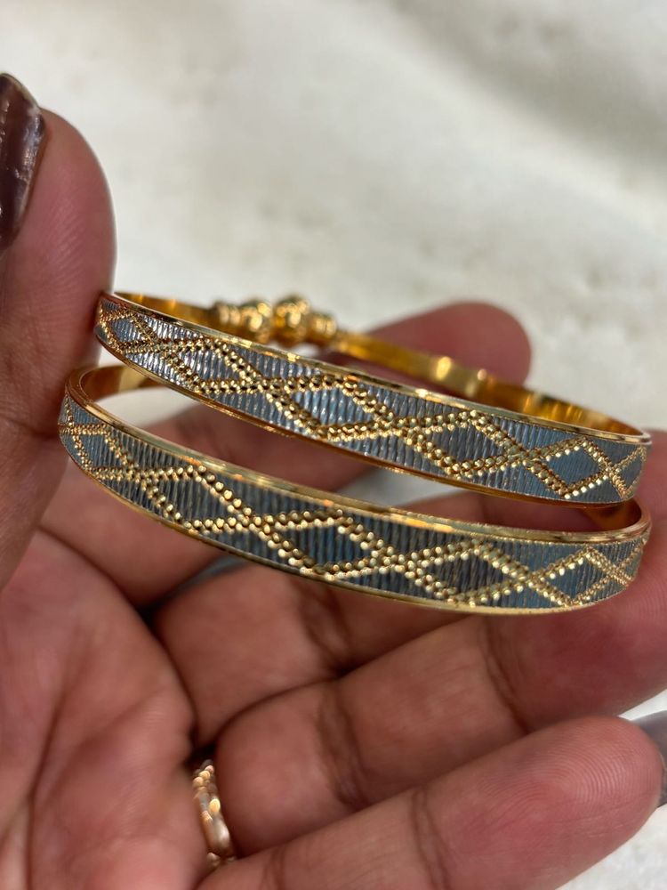 Elegant Gold Bangles with Intricate Design