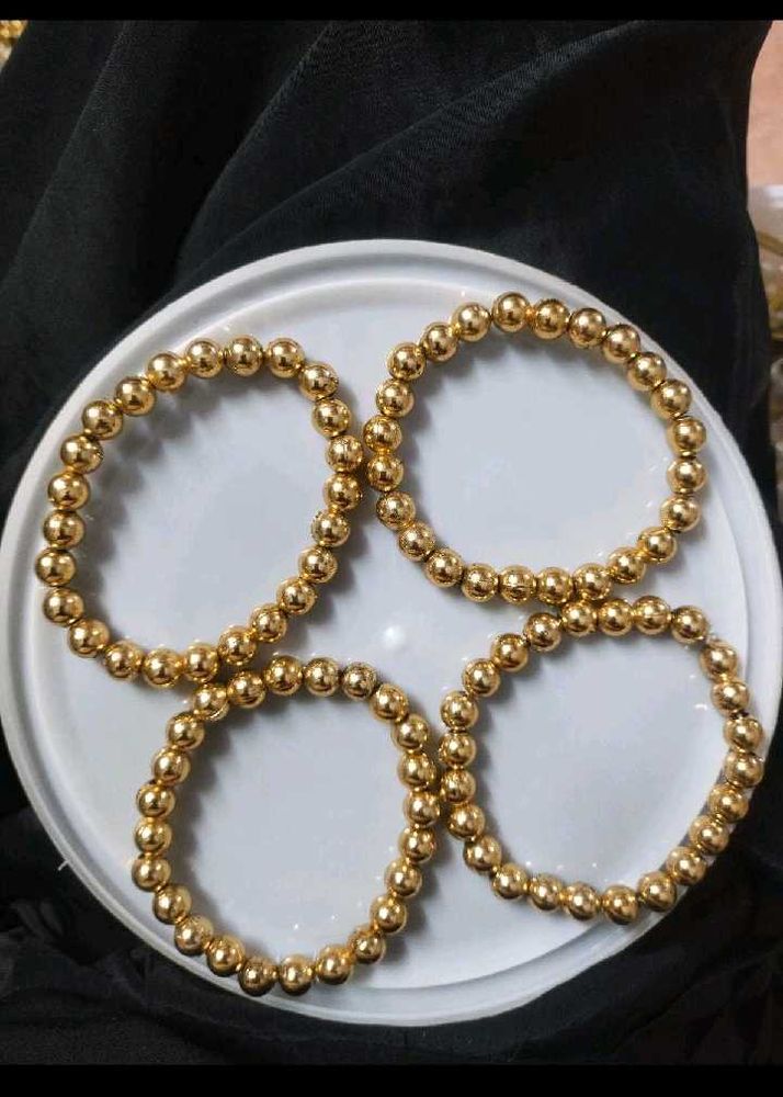Set of 4 Gold Beaded Bracelets