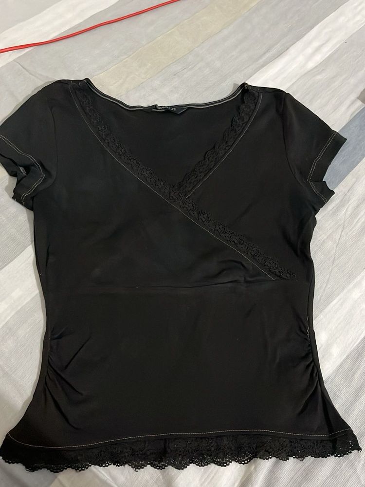 Chic Black Lace Trimmed V-Neck Top