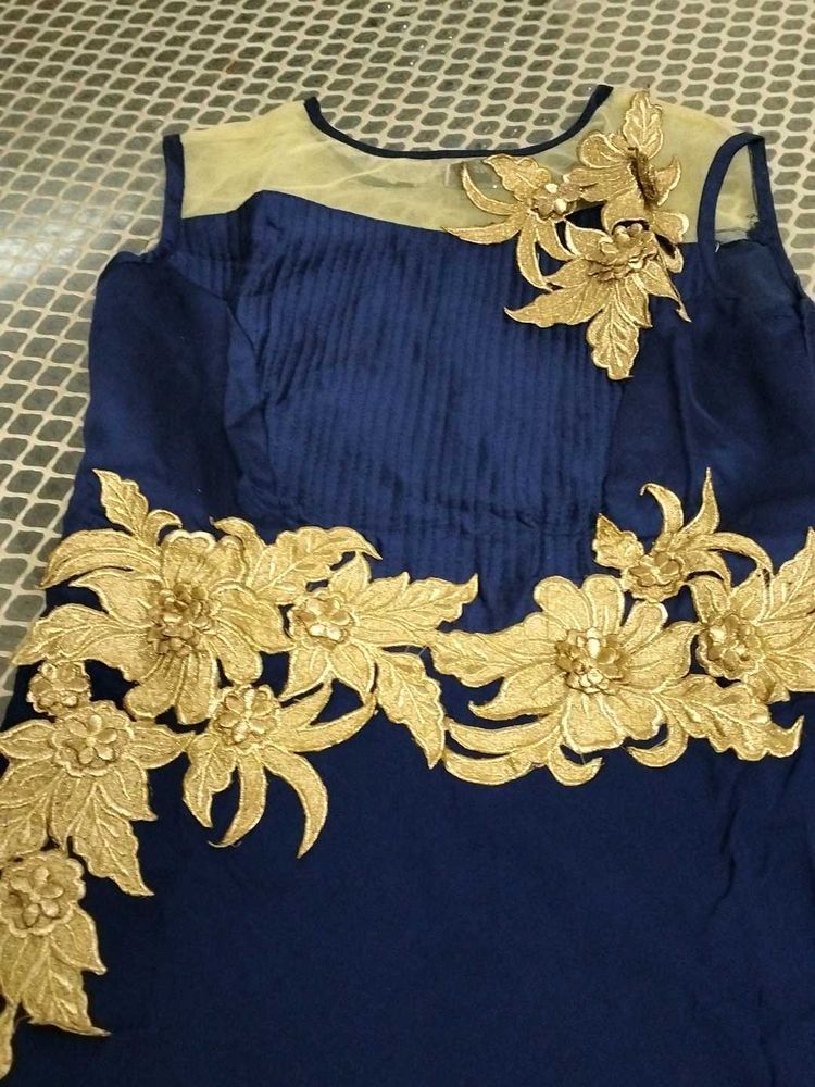 Elegant Navy Blue Dress with Gold Embellishments