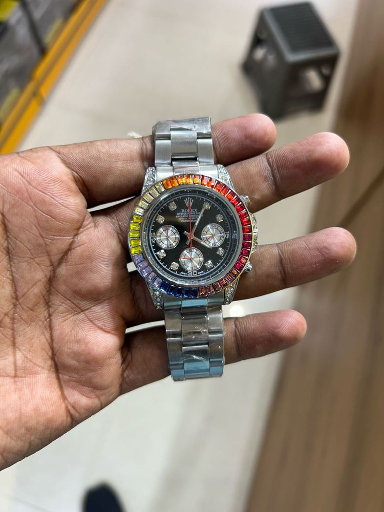 Rolex Watch with Rainbow Bezel