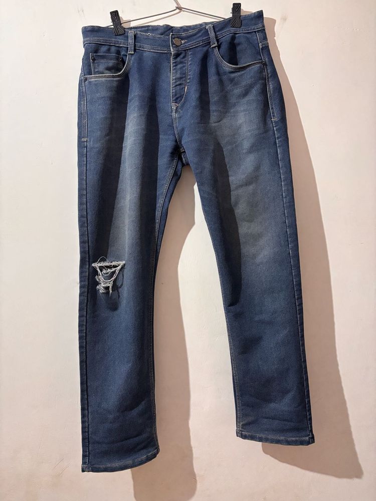 Distressed Blue Denim Jeans