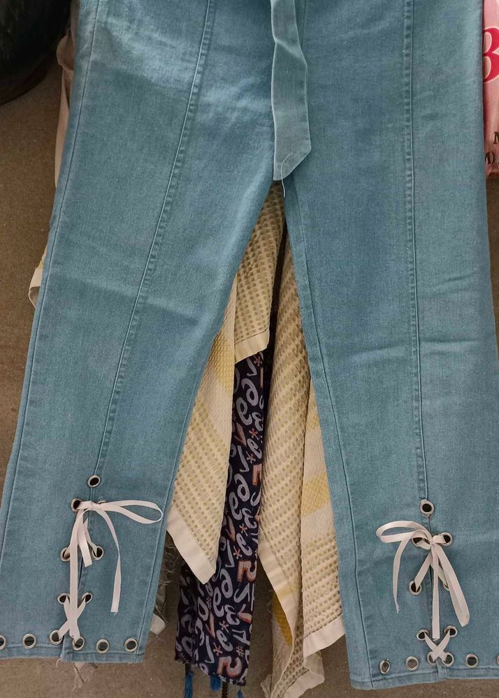 Light Wash Flare Jeans with Tie Detail