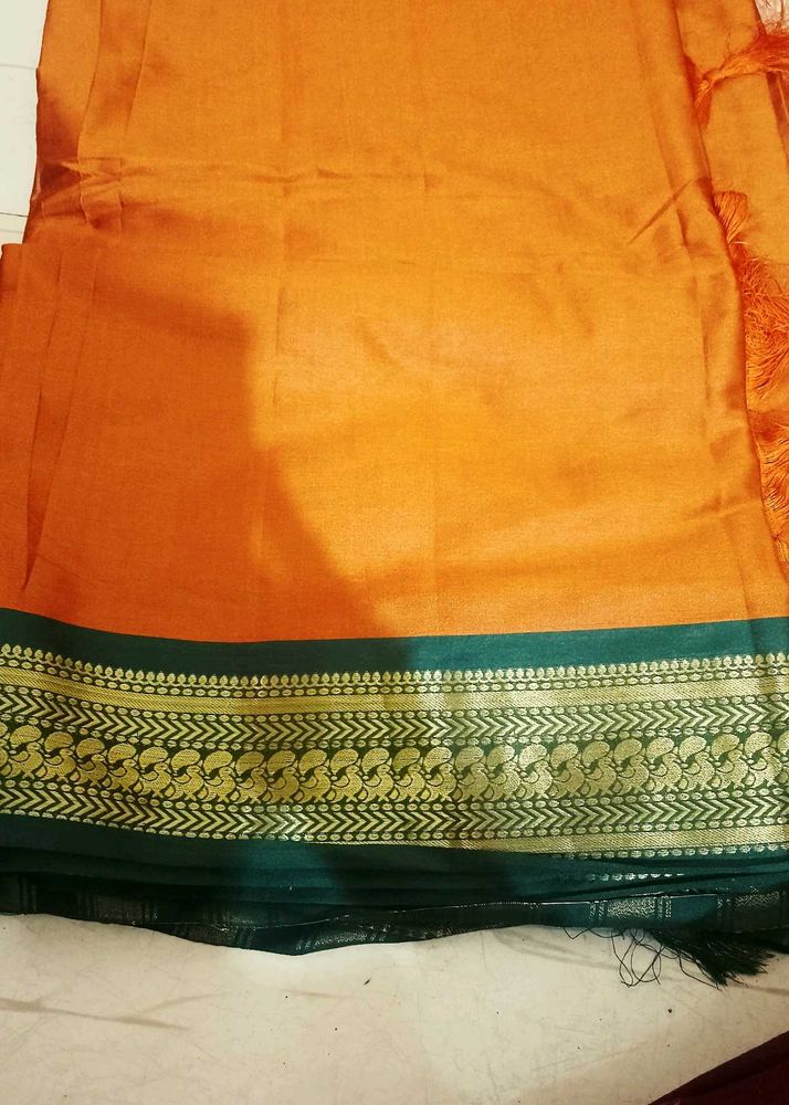 Vibrant Orange Saree with Green Border