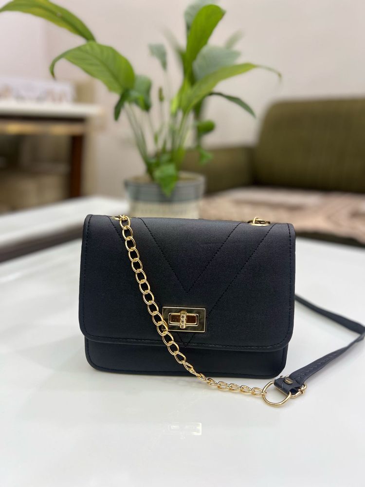 Chic Black Crossbody Bag with Chain Detail