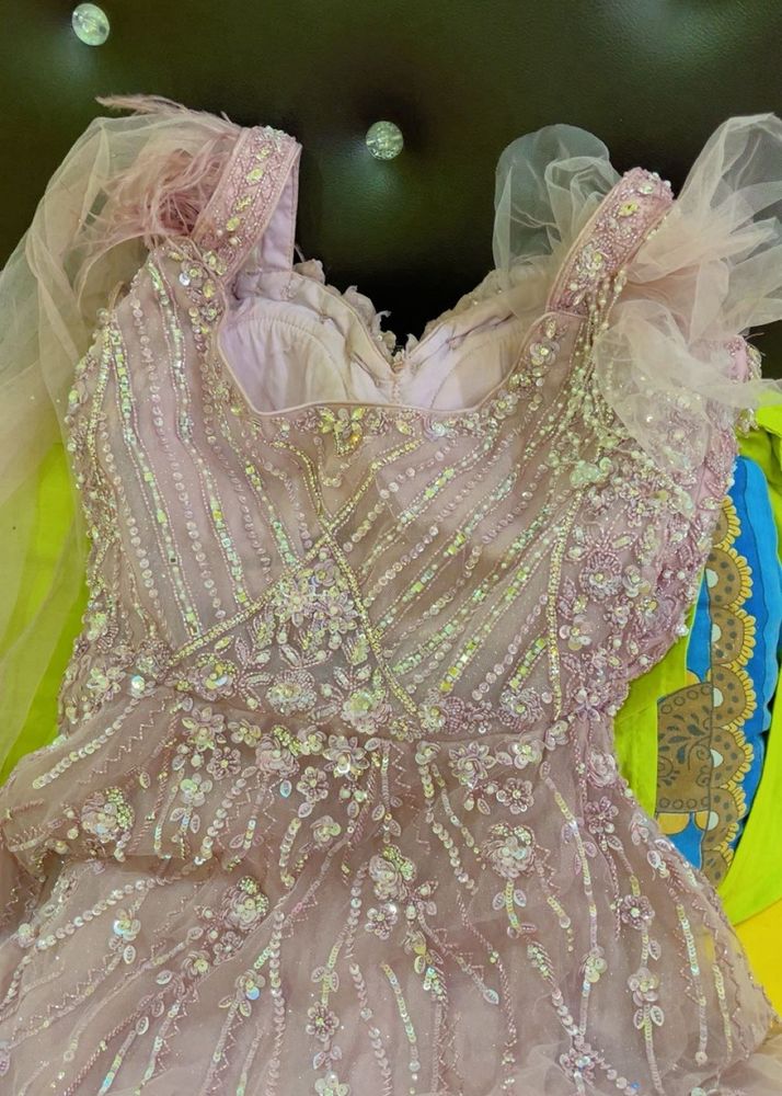 Designer gown with heavy embellishments
