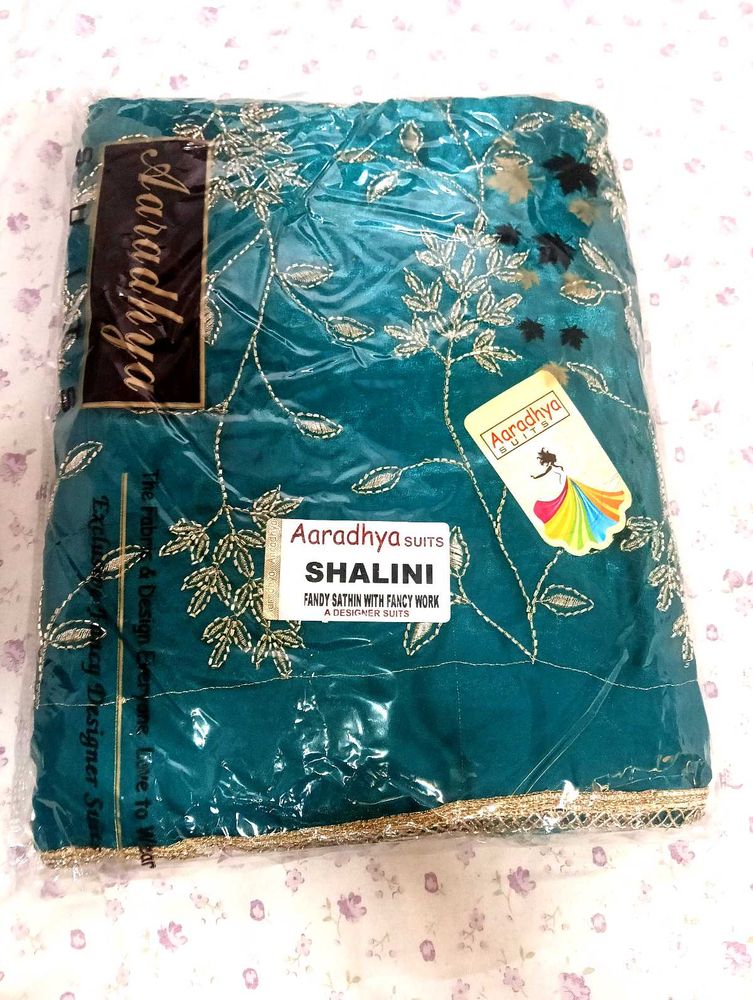 Amazing Torquiosh Green colour Suit Set