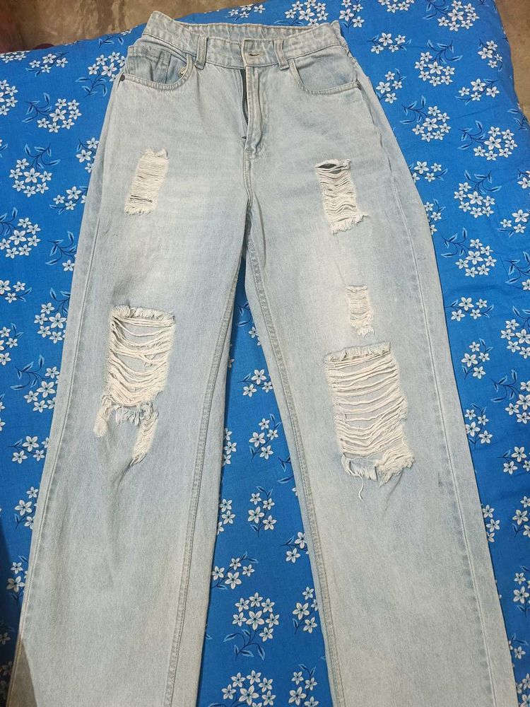 Distressed Light Wash Denim Jeans