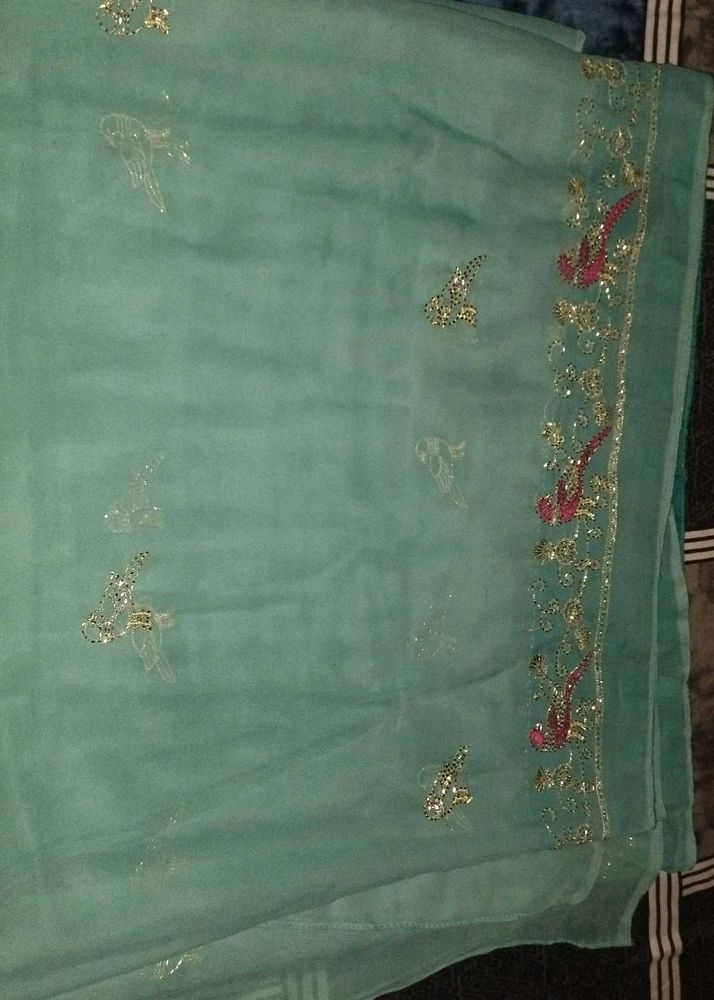 Elegant Teal Saree with Embellishments