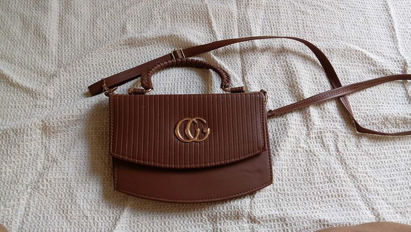 Chic Brown Handbag with Gold Logo