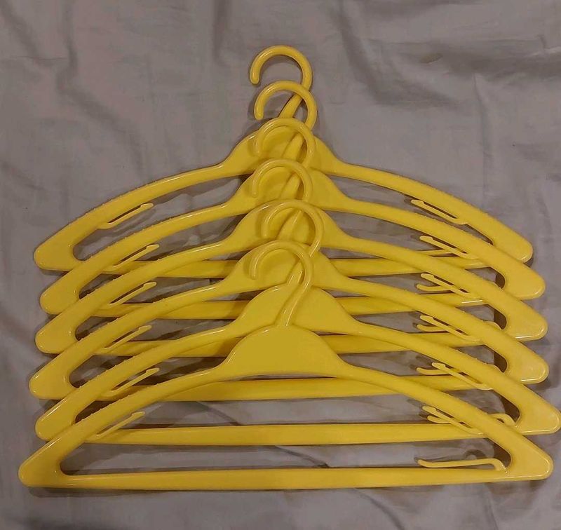 Set of 6 Yellow Plastic Hangers