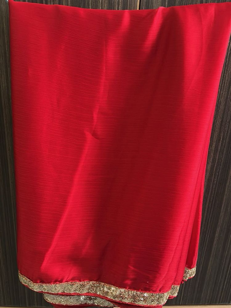 Elegant Red Saree with Sequins border