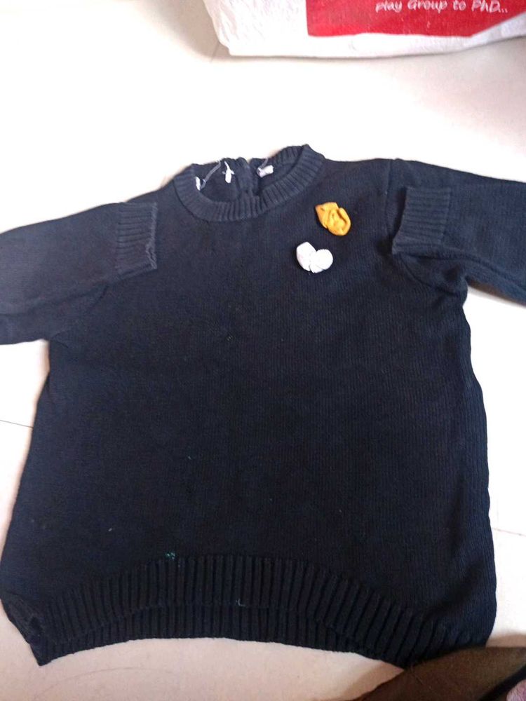 Cozy Black Knit Sweater with Applique